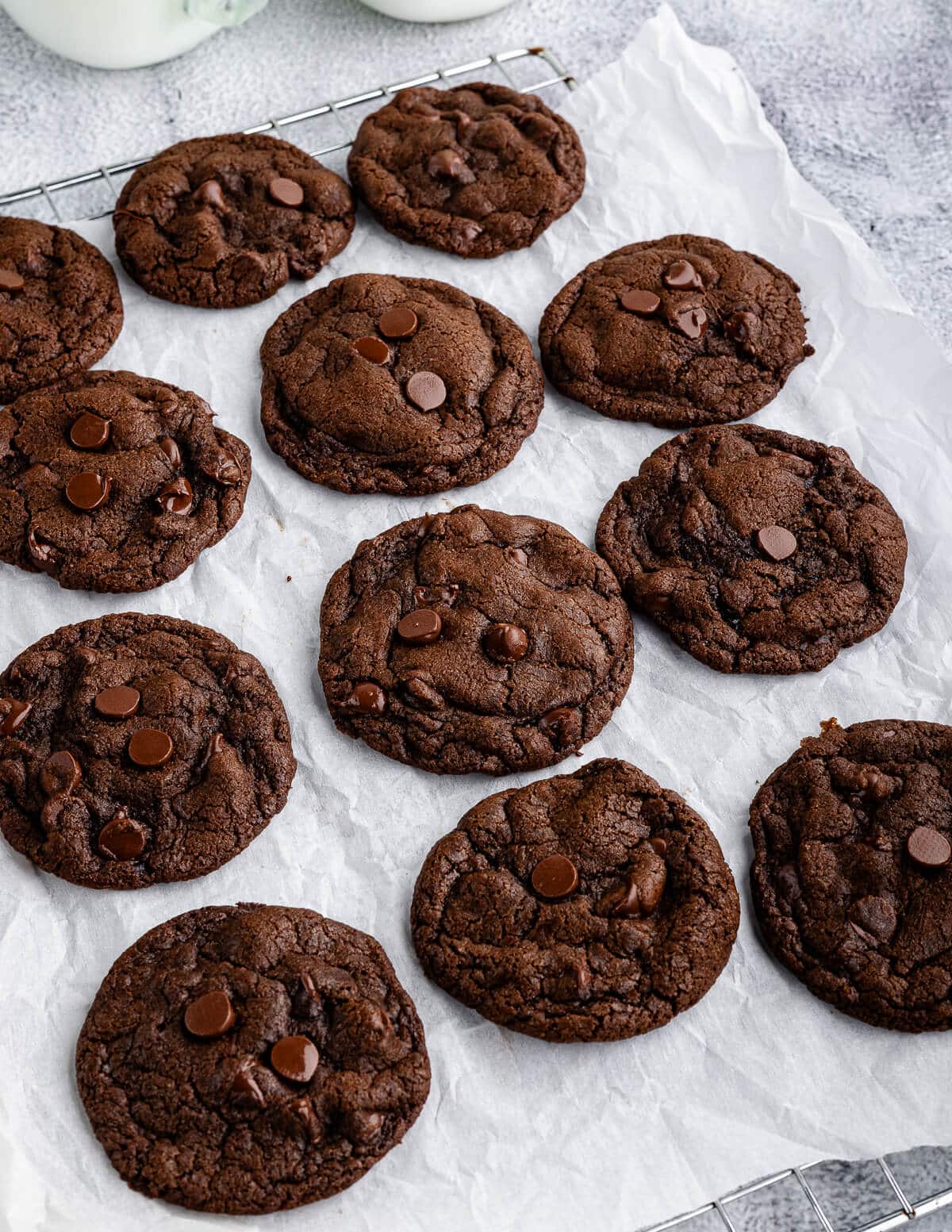 baked gluten free chocolate cookies on a sheet pan.