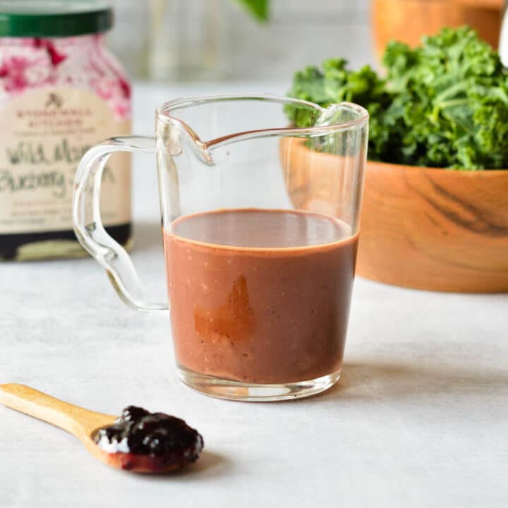 a cup of balsamic dressing
