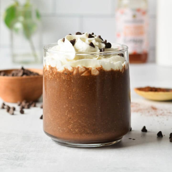 coffee smoothie with whipped cream and chocolate chips.
