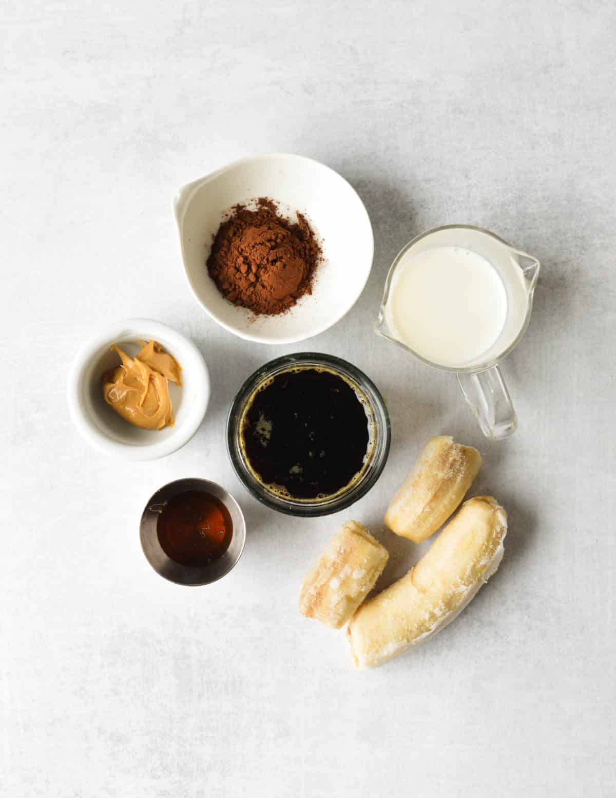 cocoa powder, milk, coffee, peanut butter, honey, frozen banana.