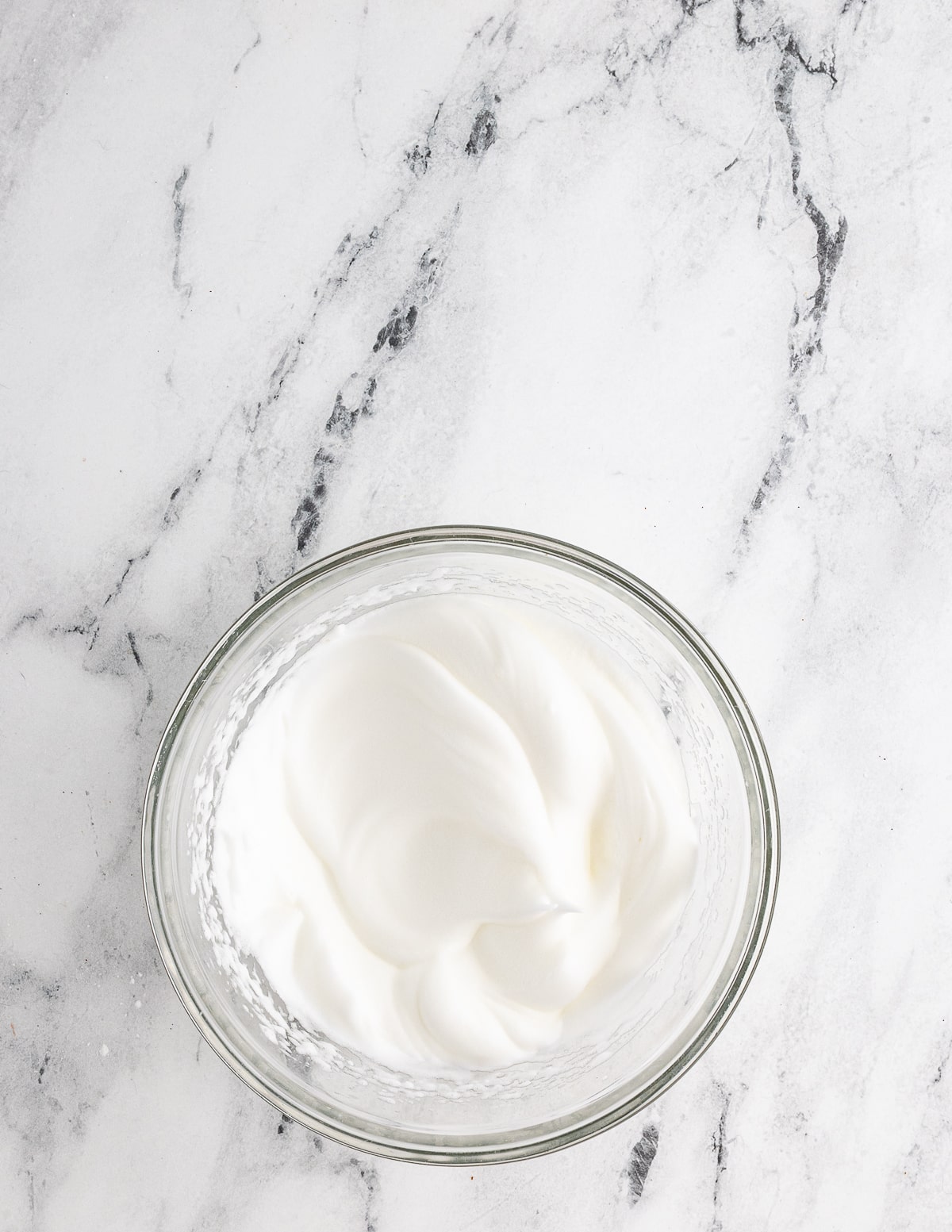 a bowl of whipped egg whites