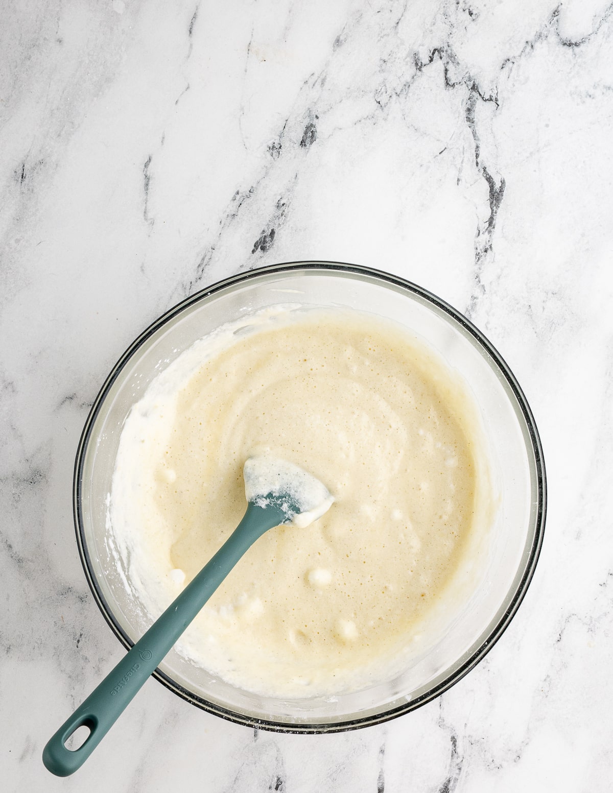 a bowl of gluten free waffle batter