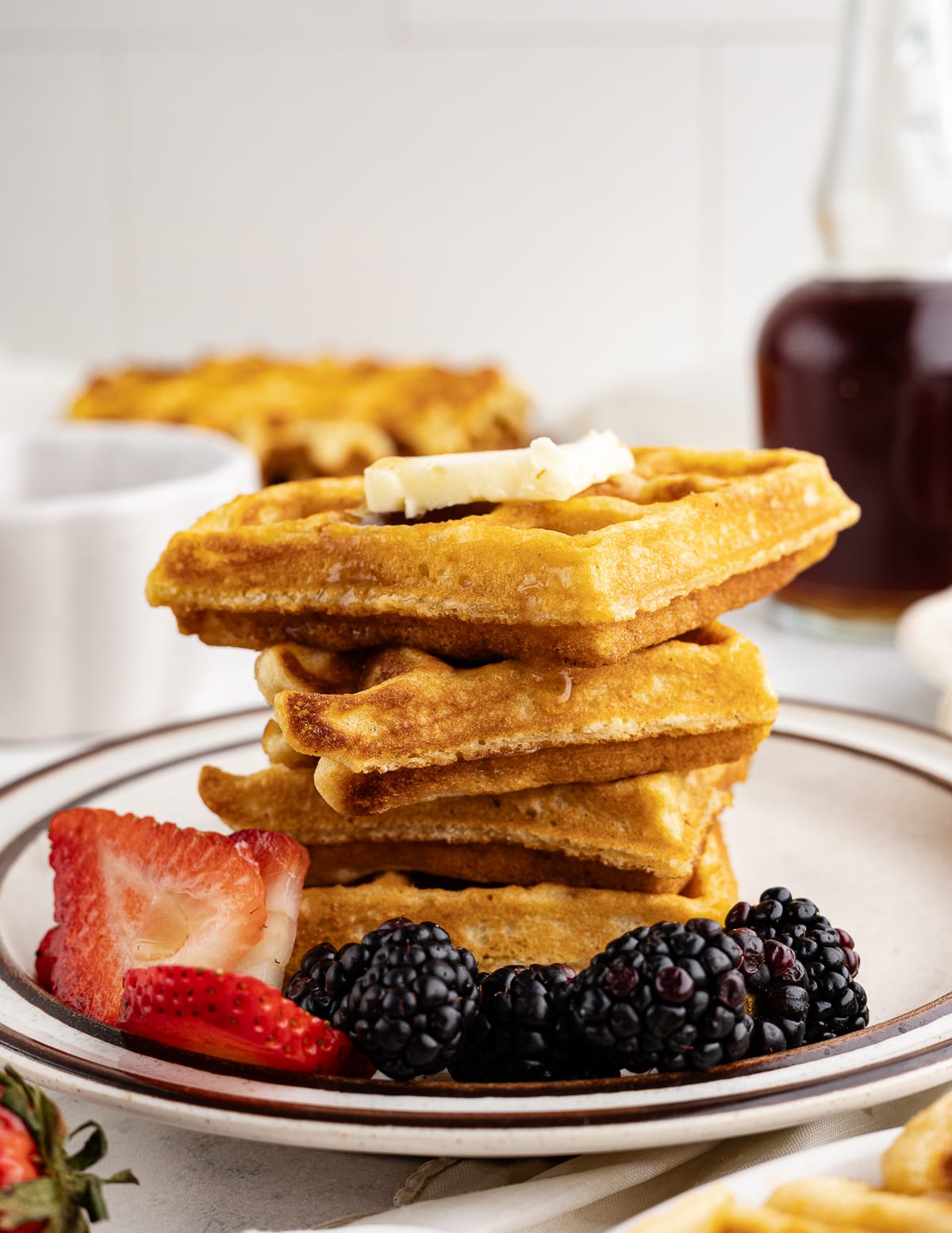 a stack of gluten free waffles.