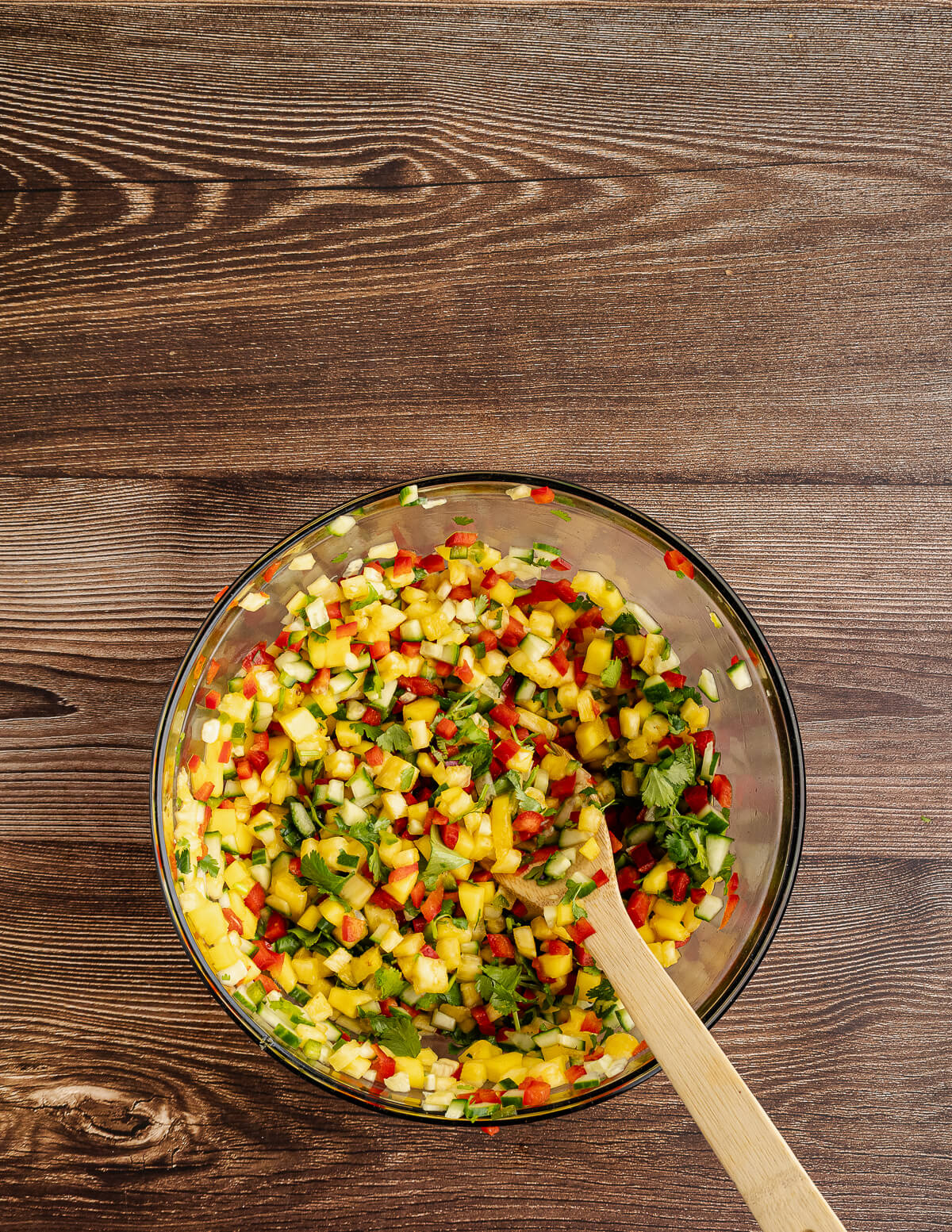 a large bowl of pineapple mango salsa.