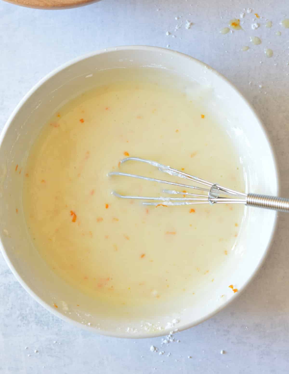 a bowl of orange glaze