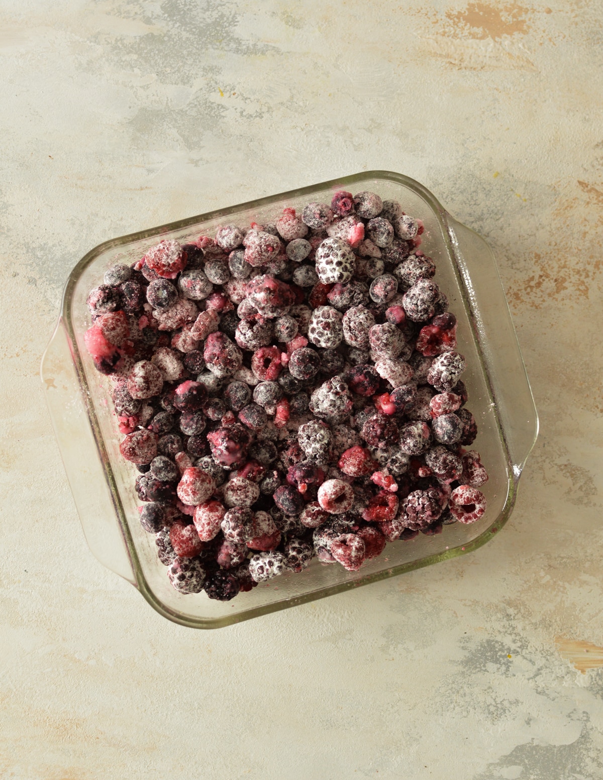 frozen berries in a baking dish