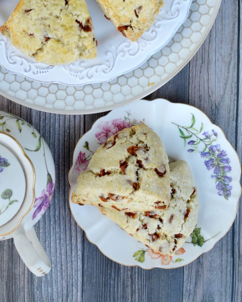 a plate of two cinnamon chip scones