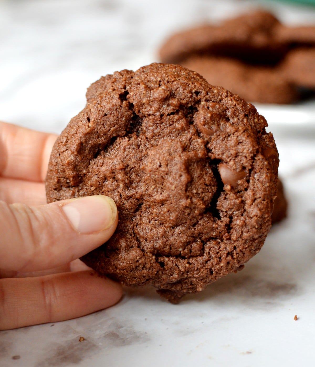 close up of chewy chocolate almond flour cookies