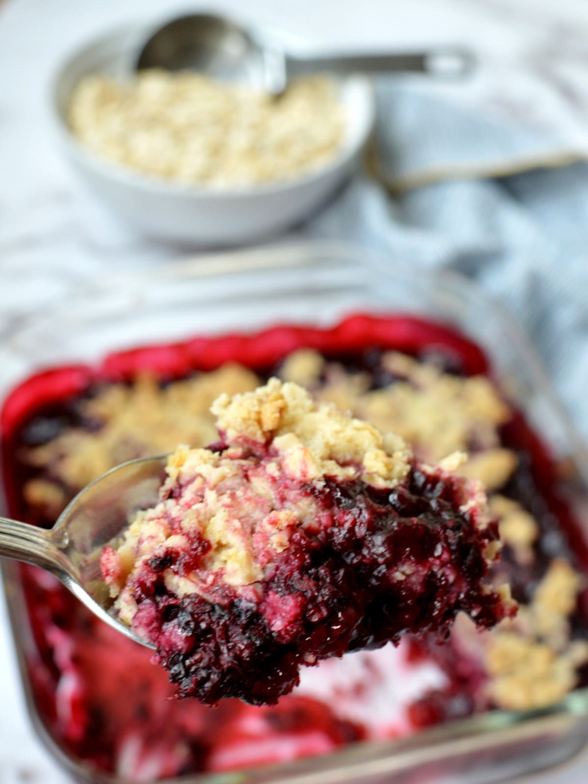 A spoonful of gluten free blackberry crisp