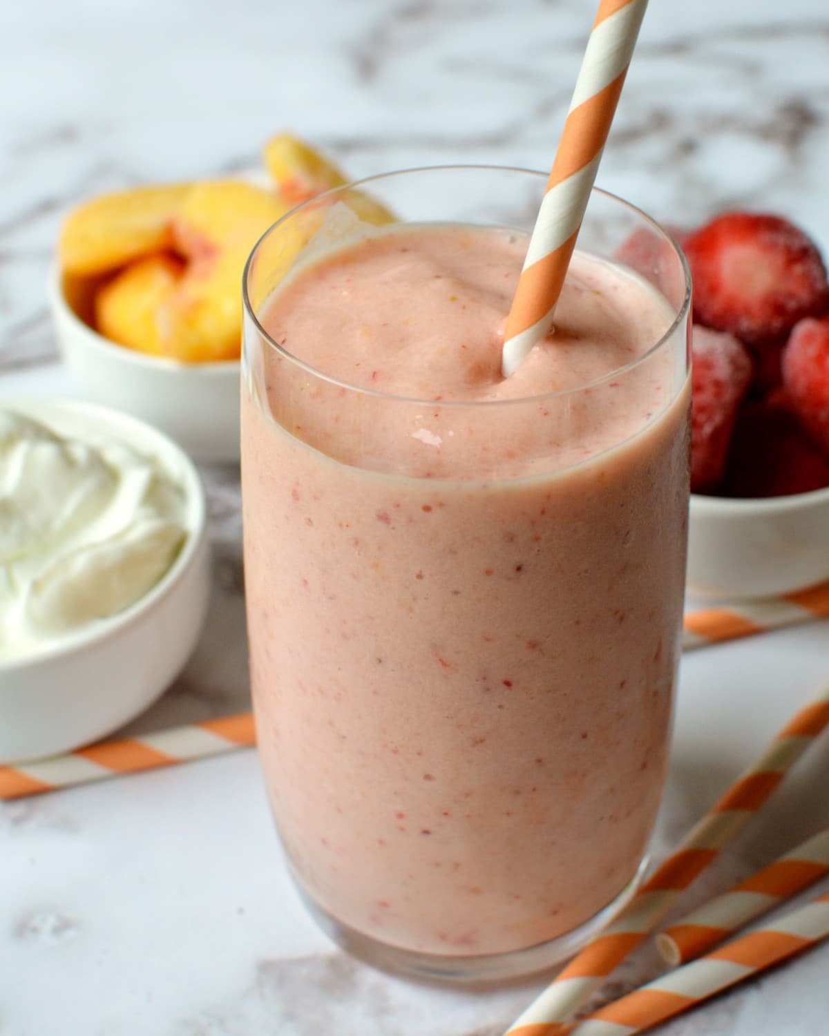 A strawberry peach smoothie with greek yogurt