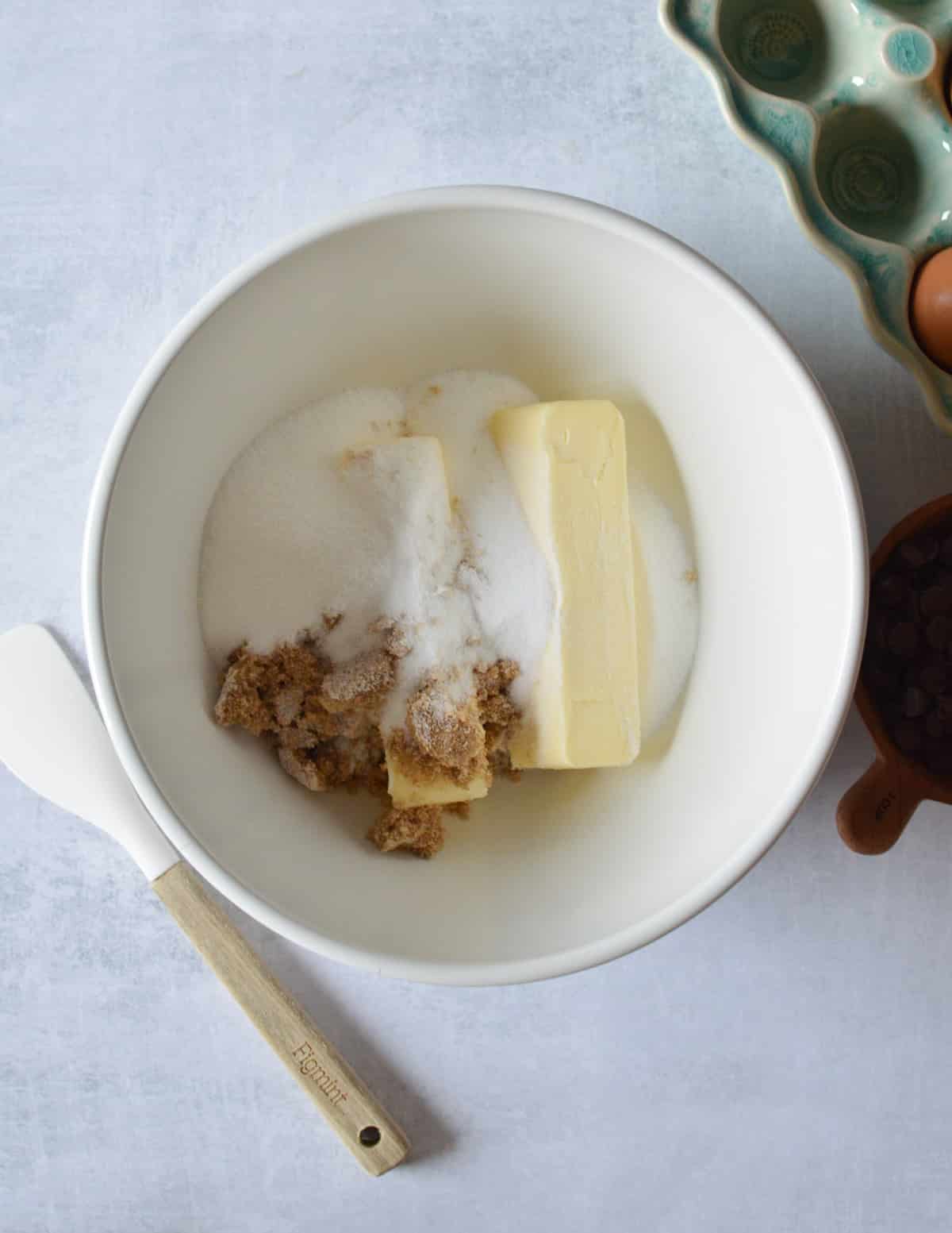 butter, sugar, and brown sugar in a large mixing bowl.