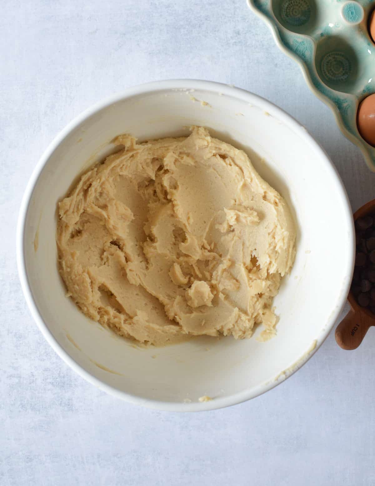 a bowl of creamed butter and sugar.