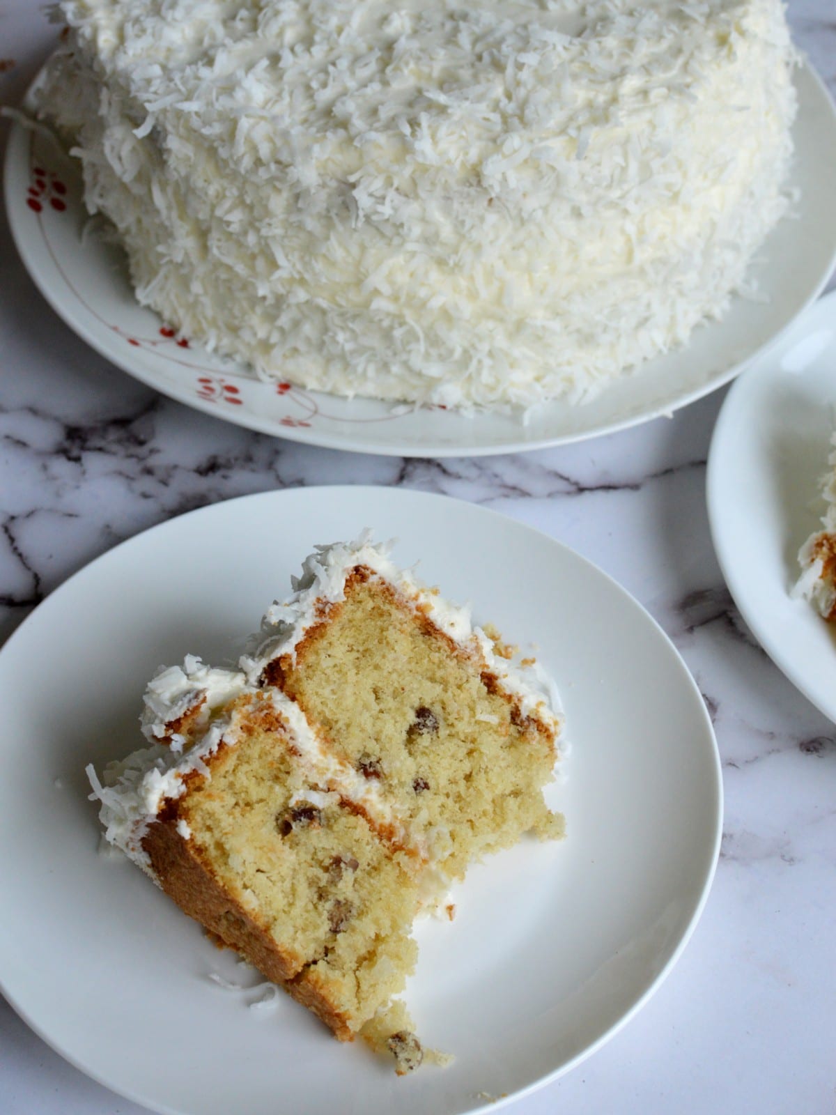 a slice of gluten free italian cream cake