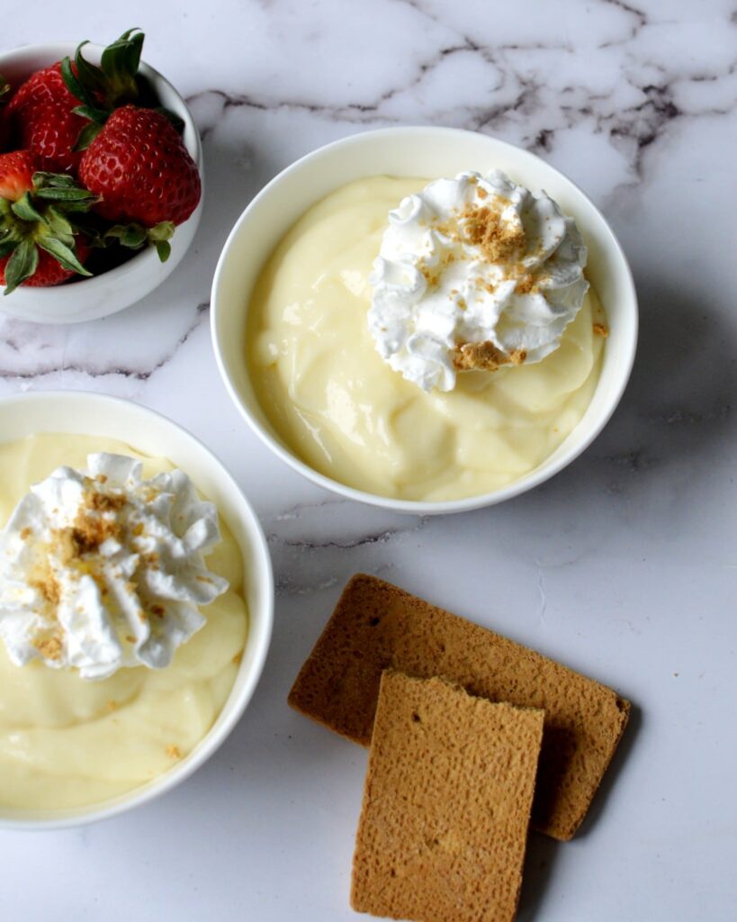 Two bowls of vanilla pudding