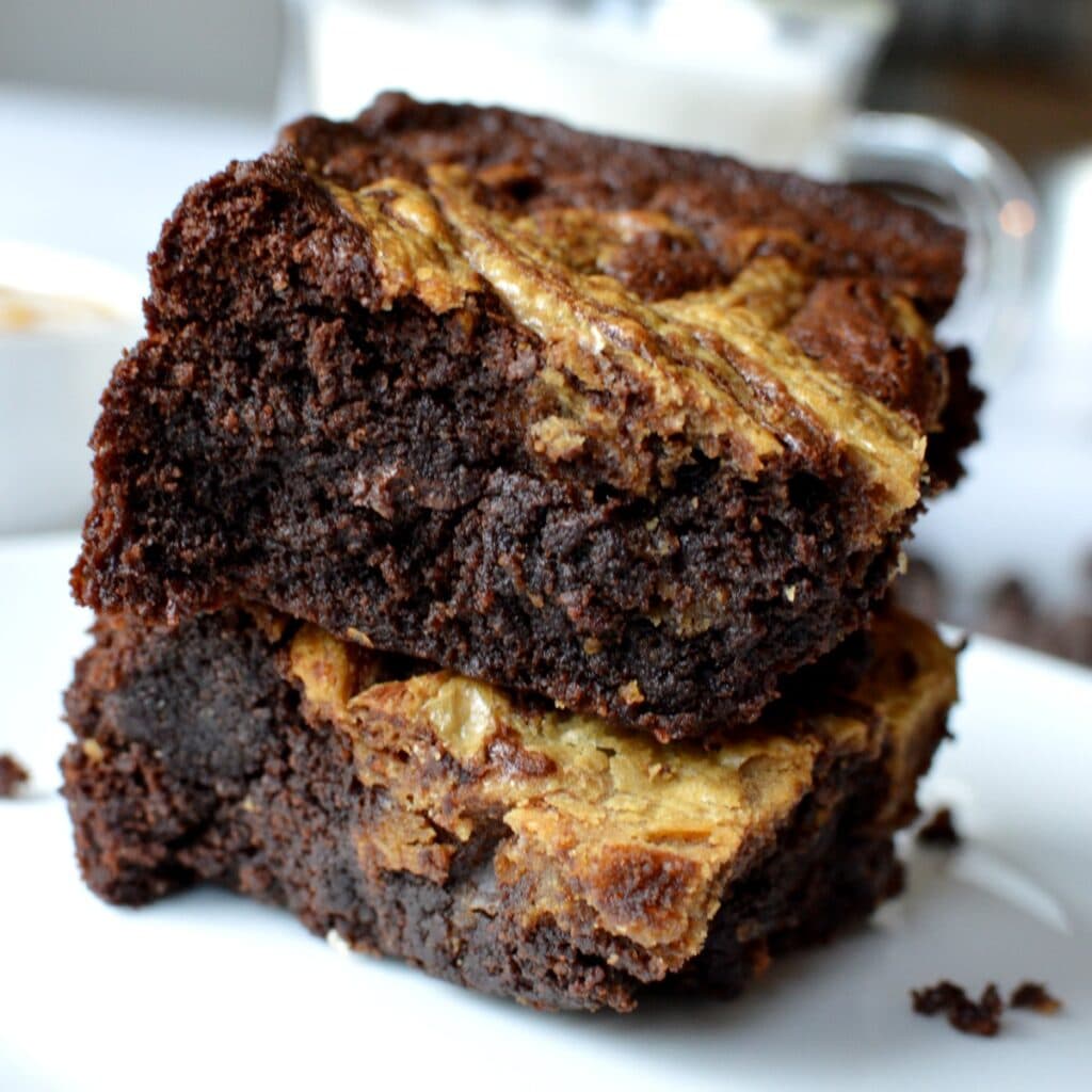 Gluten Free Peanut Butter Swirl Brownies caramel and cashews