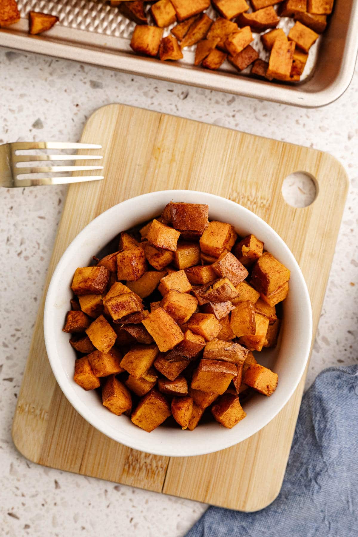 a bowl of roasted sweet potatoes.