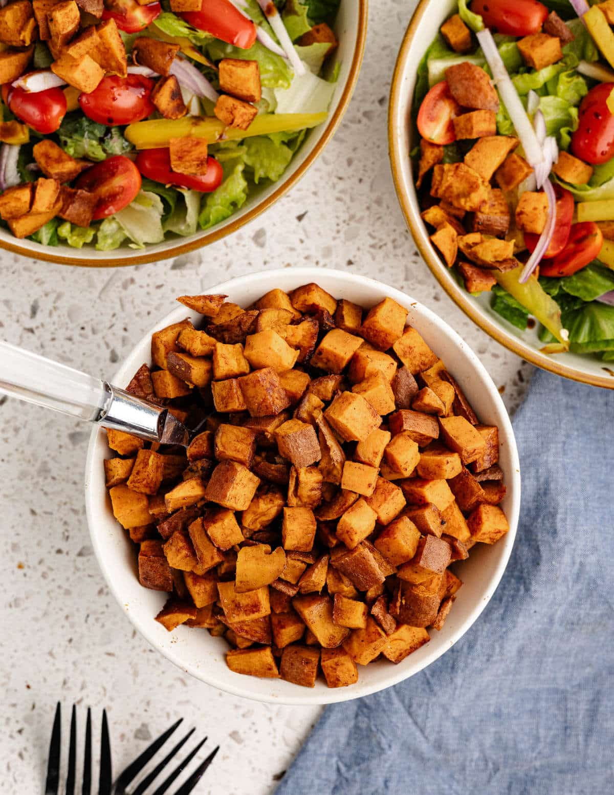 a bowl of roasted sweet potatoes.