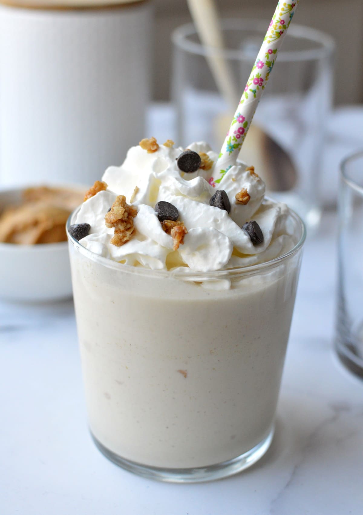 a peanut butter milkshake with whipped cream