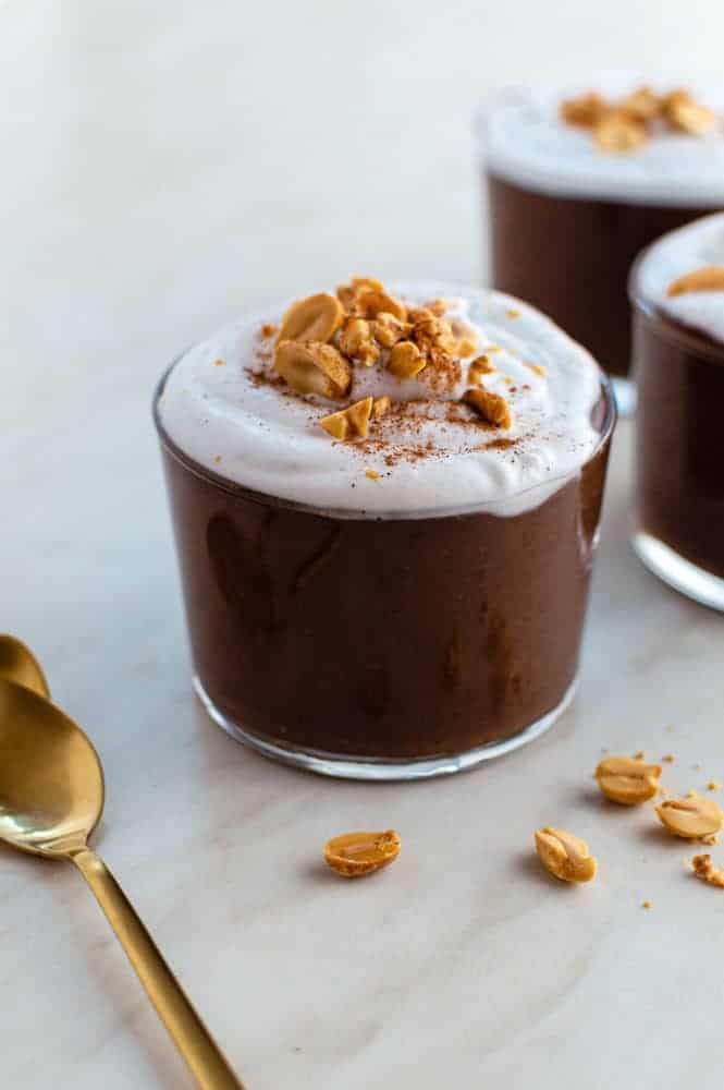 a glass of vegan chocolate pudding