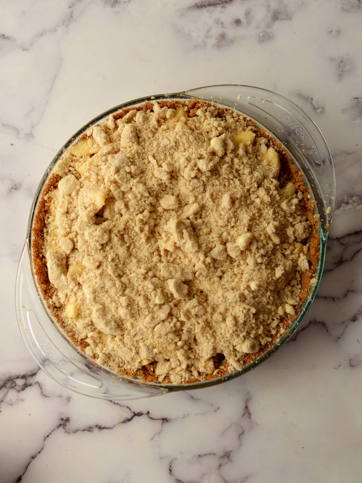 an unbaked apple pie graham cracker crust