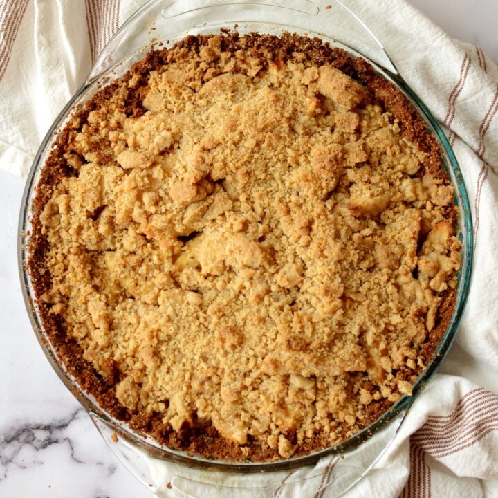an apple pie with a graham cracker crust