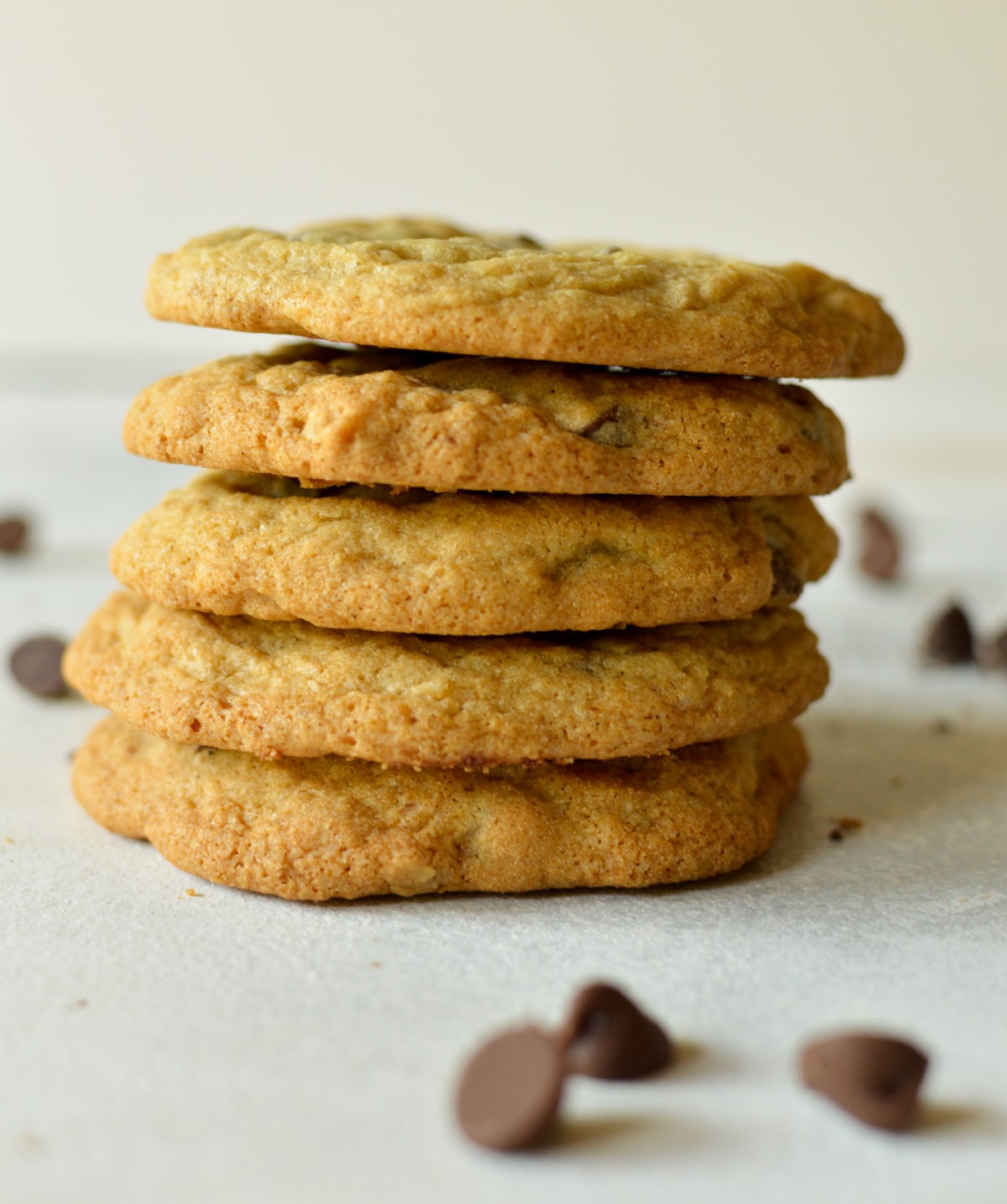 a stack of gluten free chocolate chip cookies