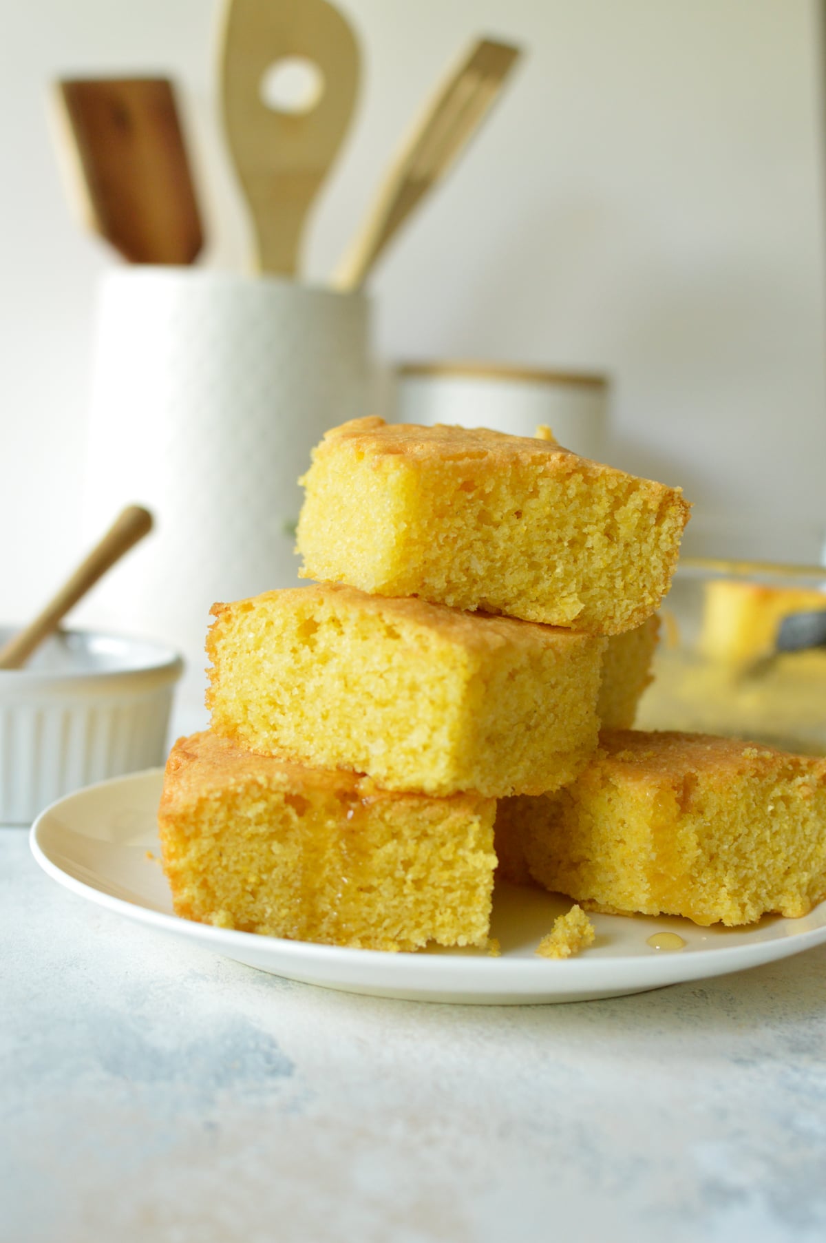 a plate with cornbread on it