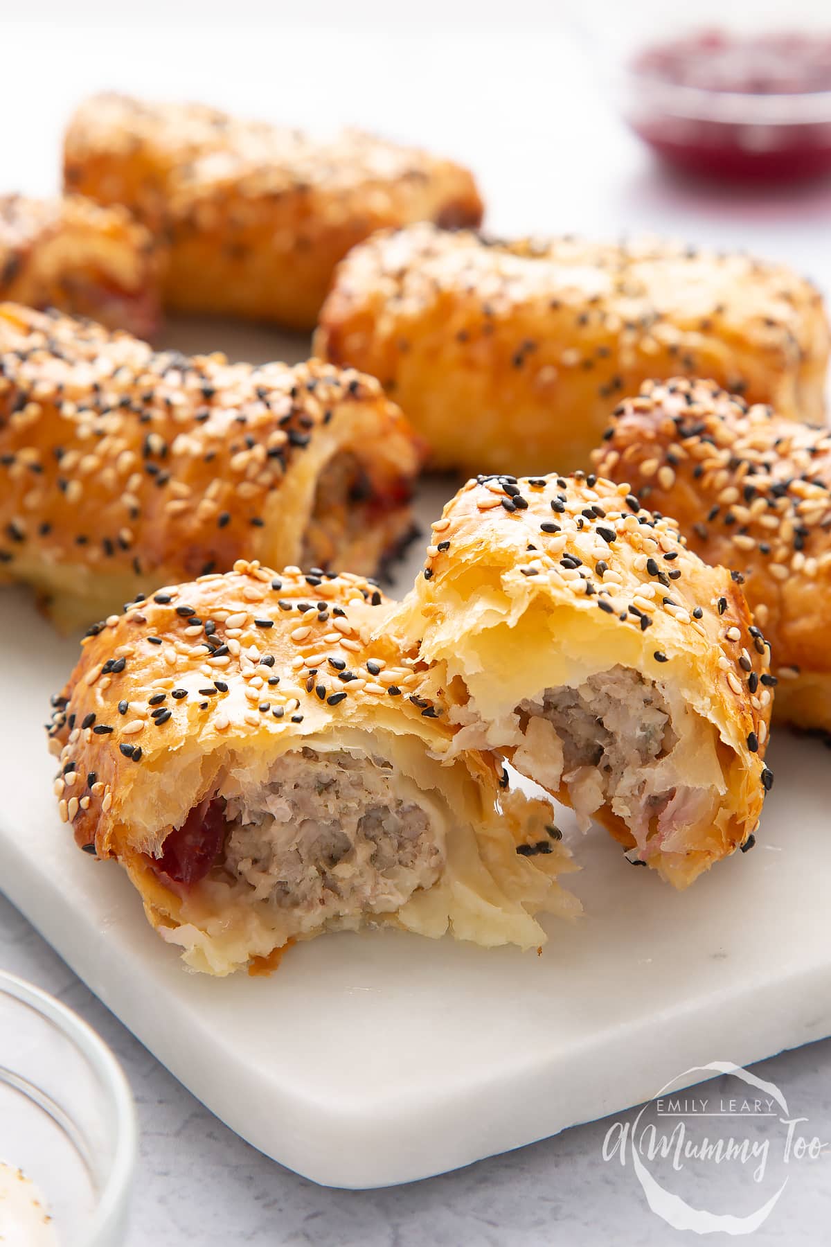 sausage rolls with sesame seeds