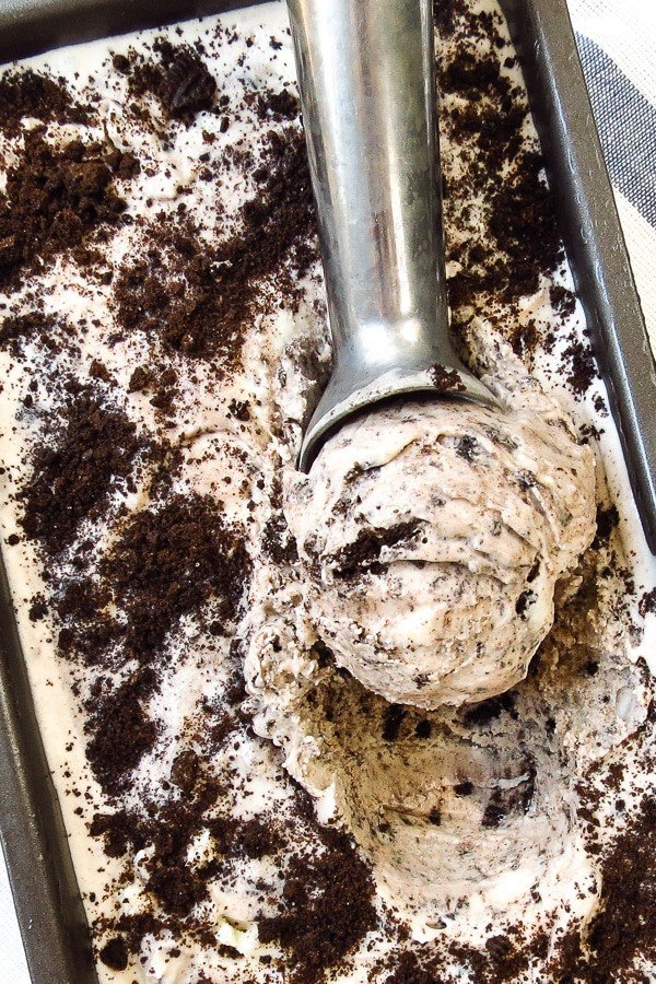 cookies and cream ice cream with a scoop in it