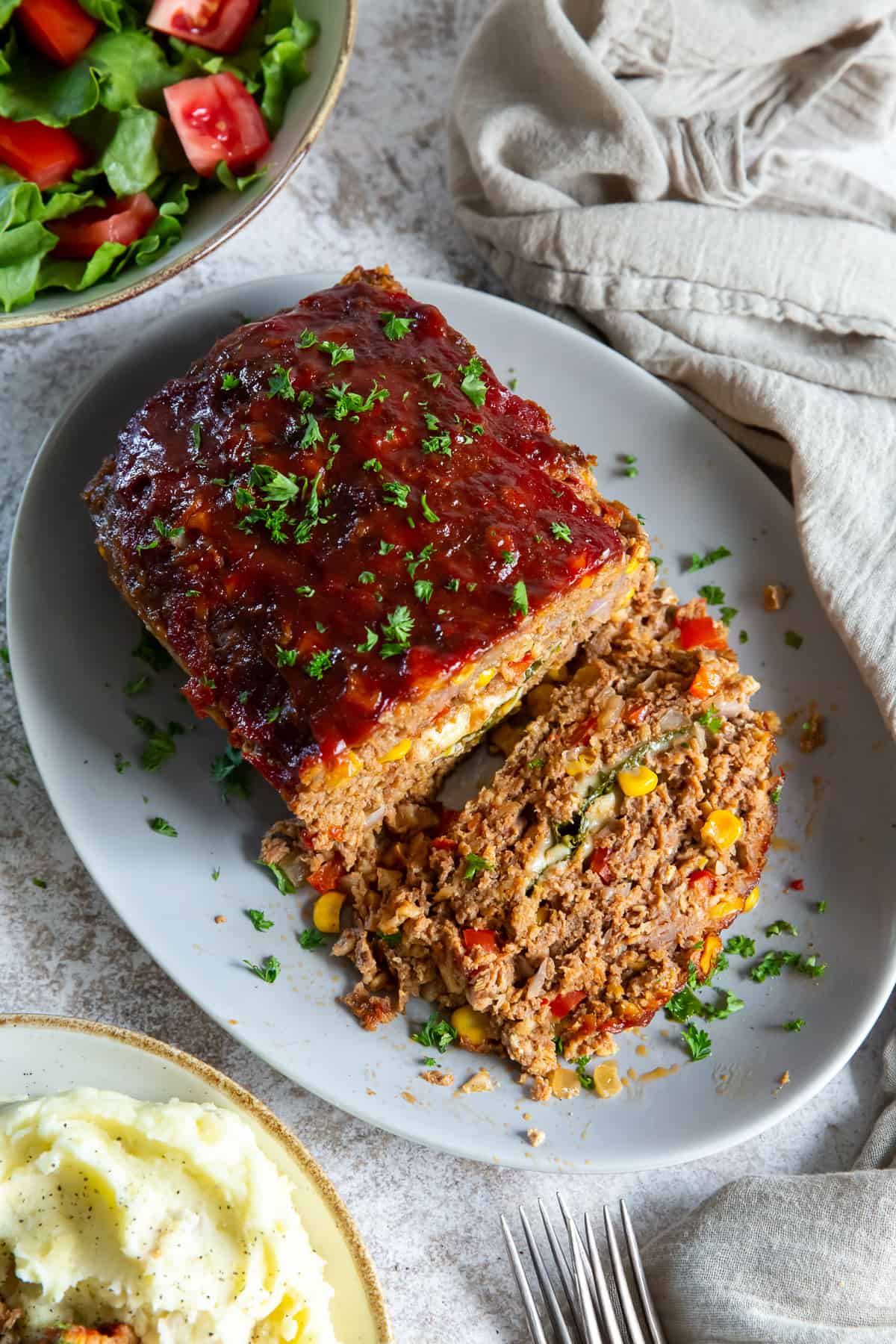 a meatloaf sliced on a plate