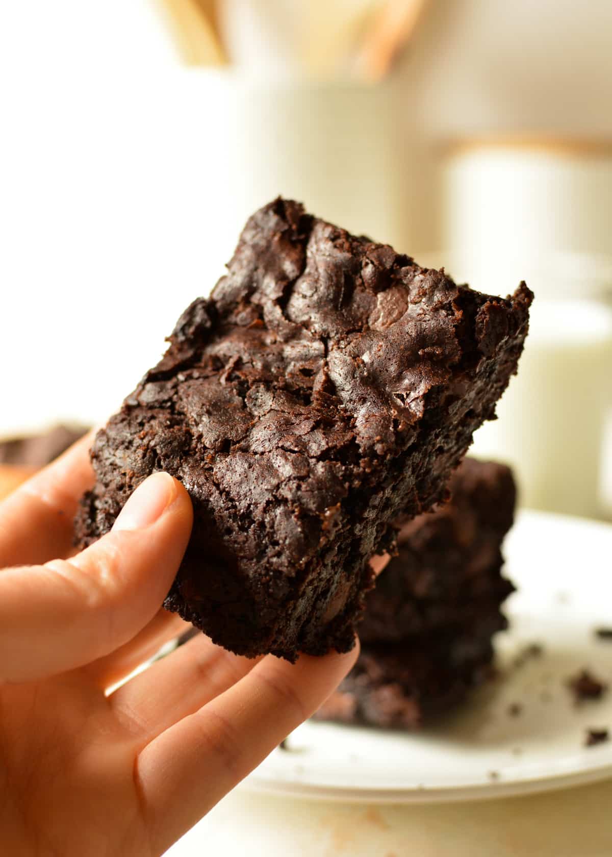 hand holding a gluten free brownie