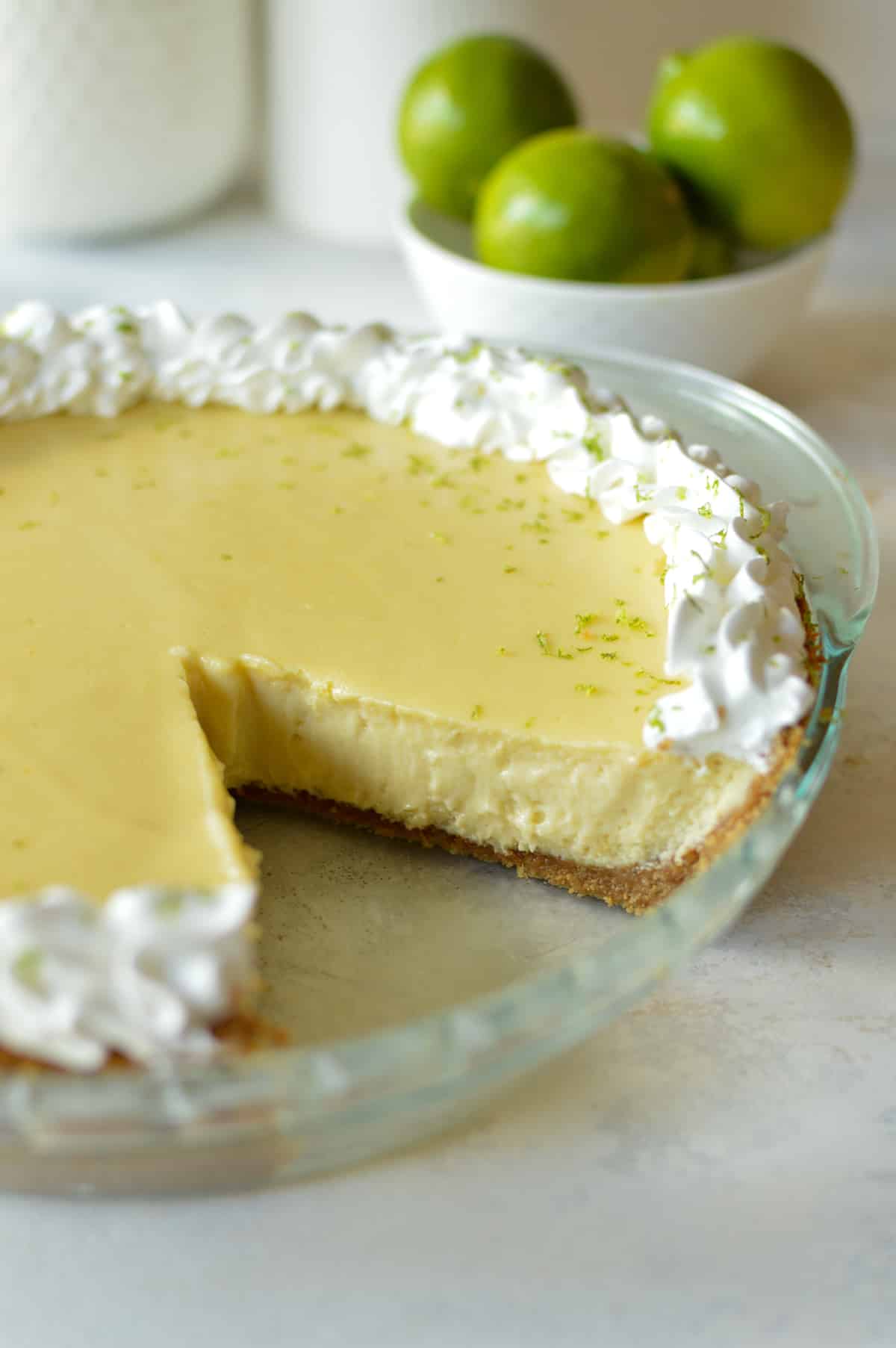 a slice out of a gluten free key lime pie