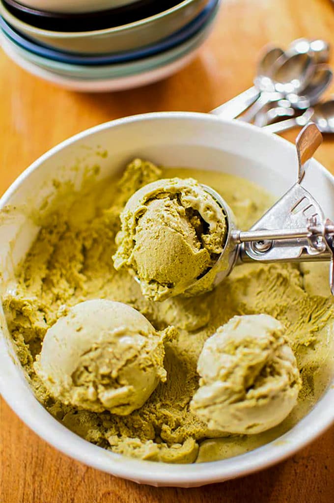 a scoop of matcha ice cream in a bowl