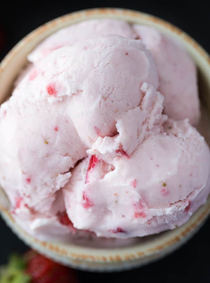 a bowl of strawberry ice cream