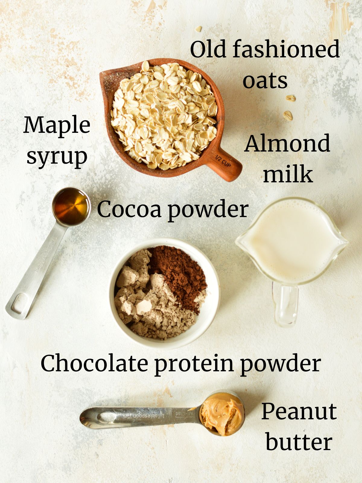 oats, almond milk, peanut butter, protein powder, cocoa powder, and maple syrup