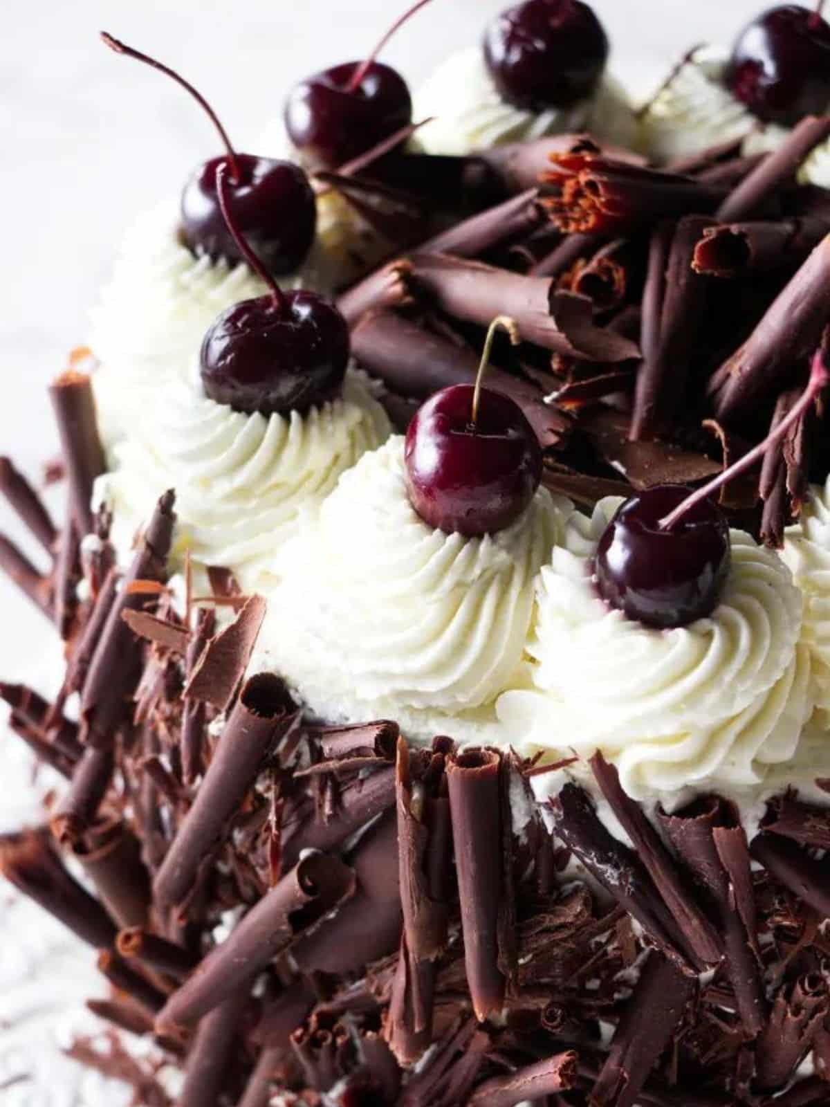 a close up of black forest cherry cake