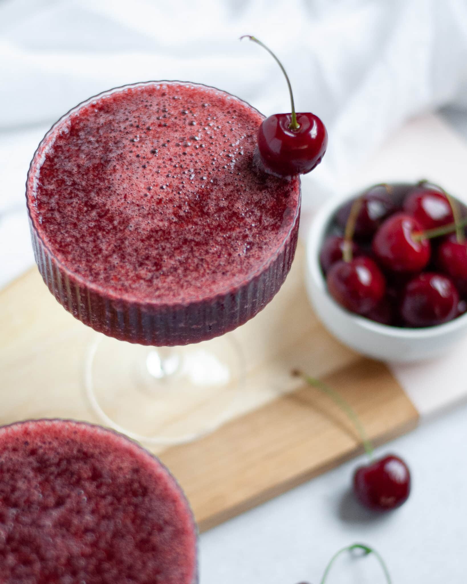 a cherry frozen cocktail