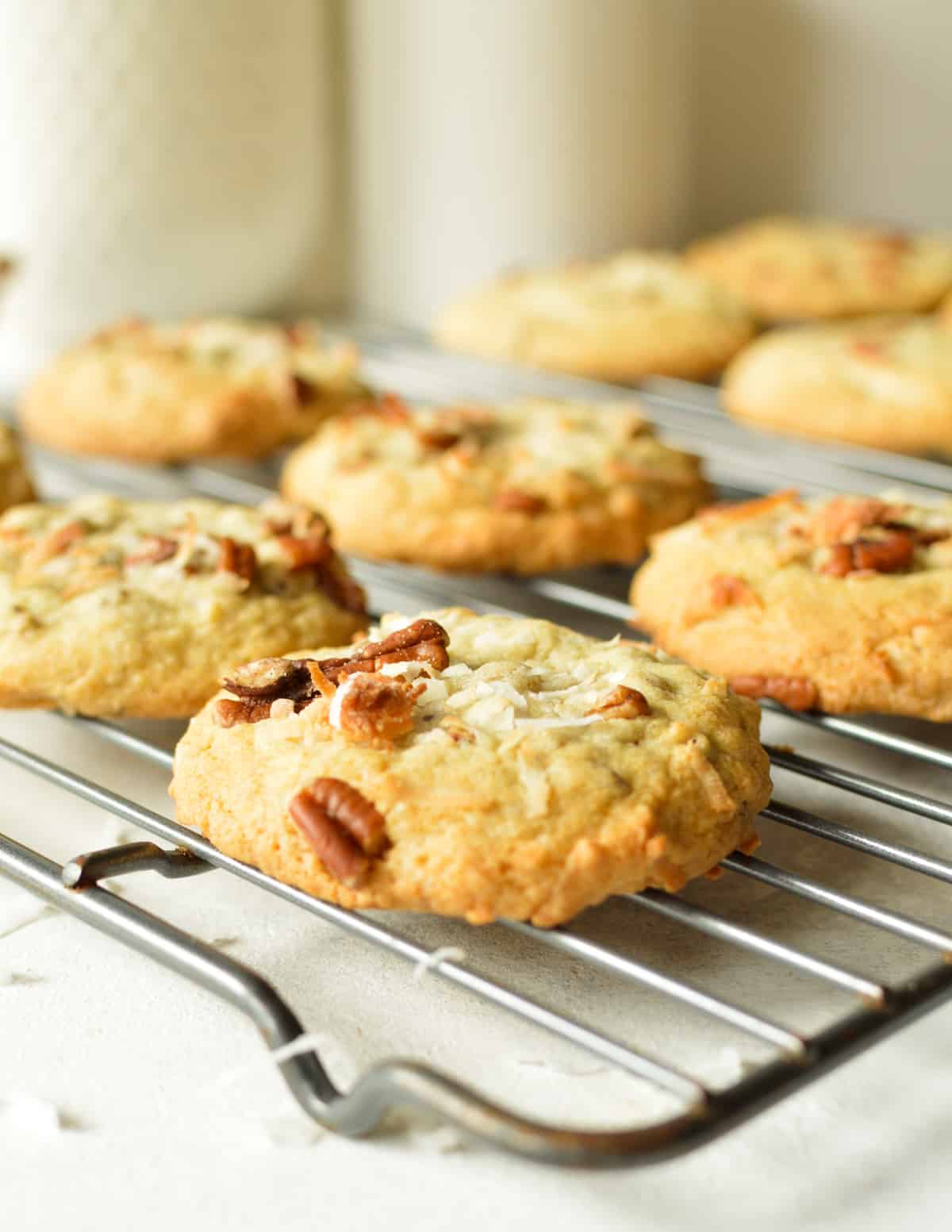 coconut pecan cookies on wire rack