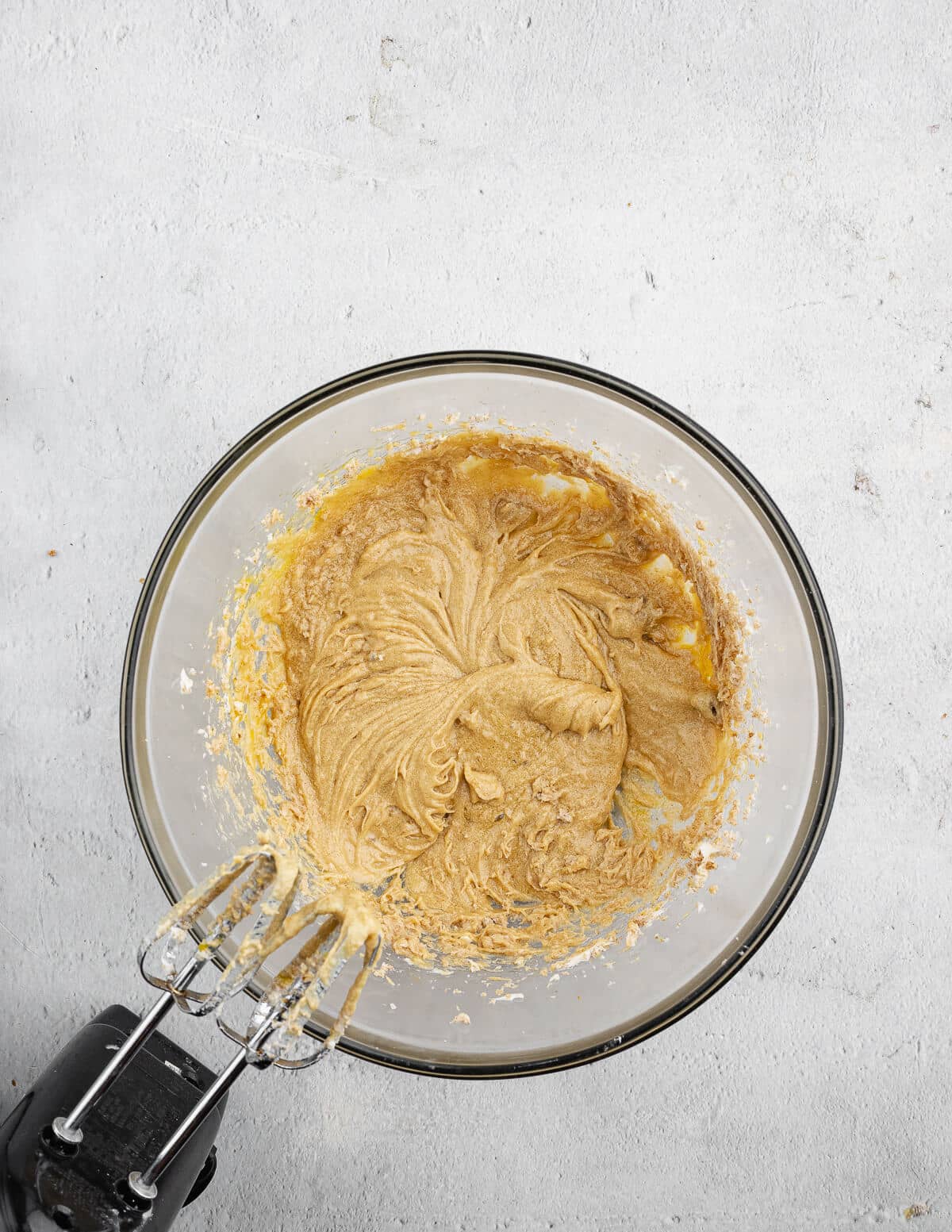 creamed butter, sugar, and eggs in a bowl.