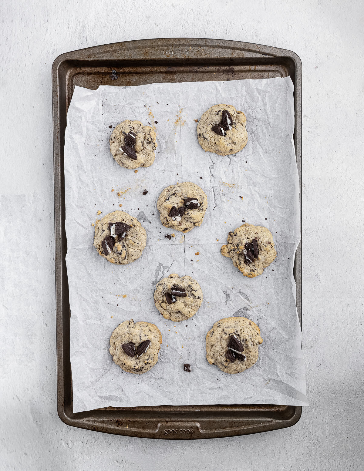 cookies and cream cookies on a sheet pan.