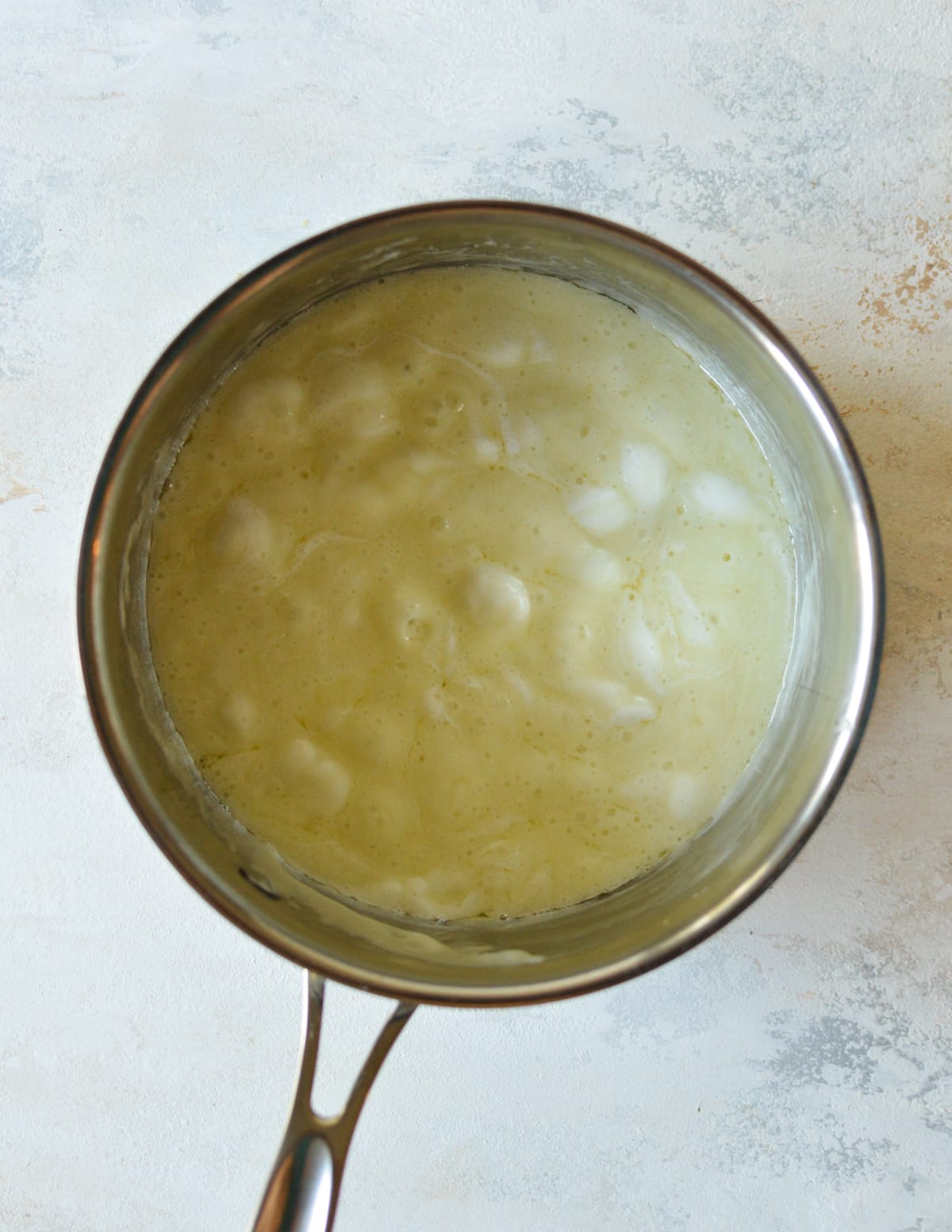 melted butter and marshmallows in a pot