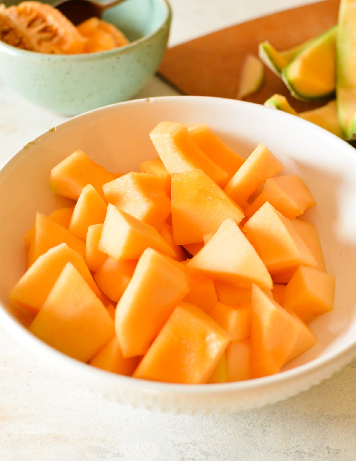 a bowl of cantaloupe chunks.