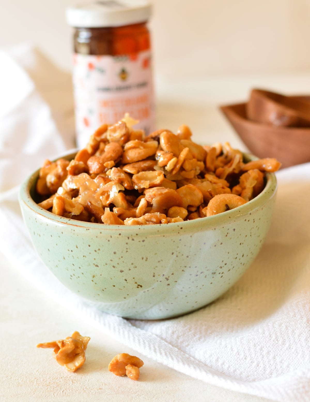 a bowl of honey roasted cashews.