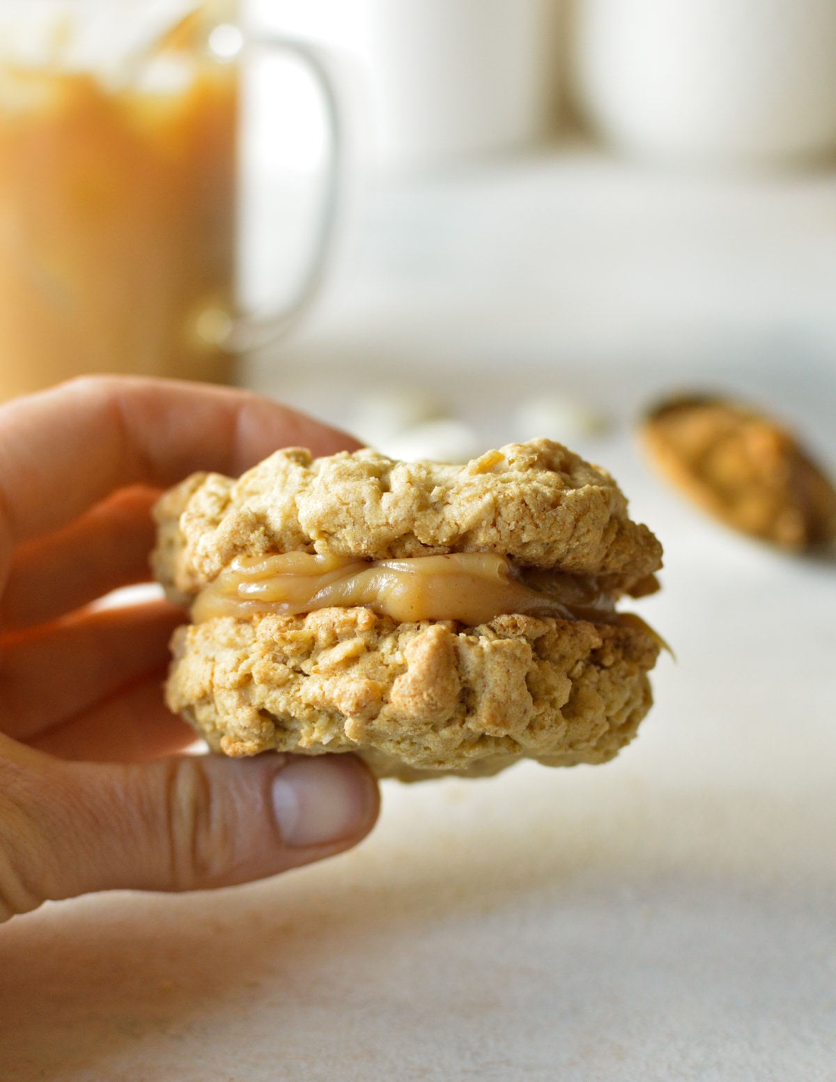 an oatmeal cookie filled with peanut butter ganache.