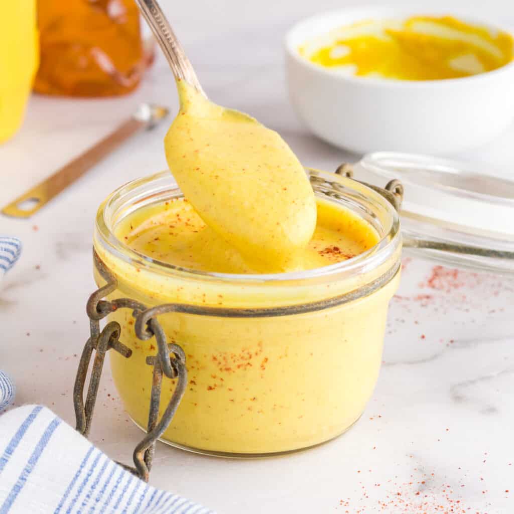 a jar of honey mustard sauce. 