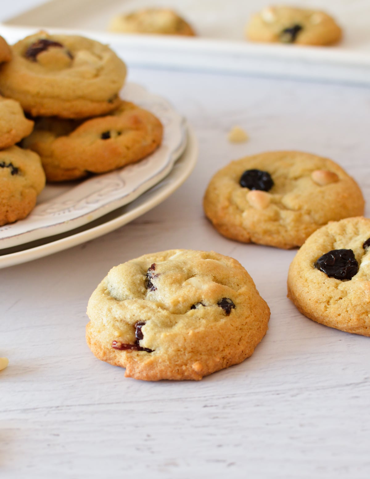 a cookie with dried cherries and white chocolate chips.