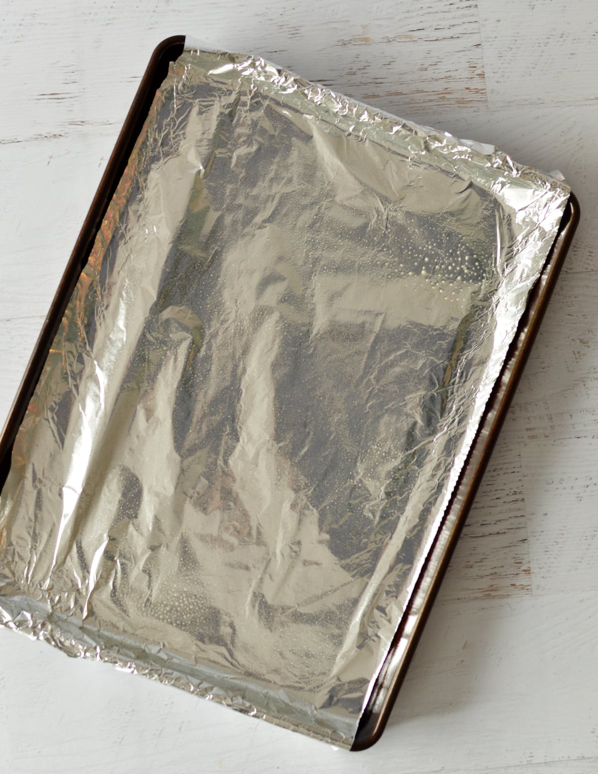 a sheet pan with aluminum foil.