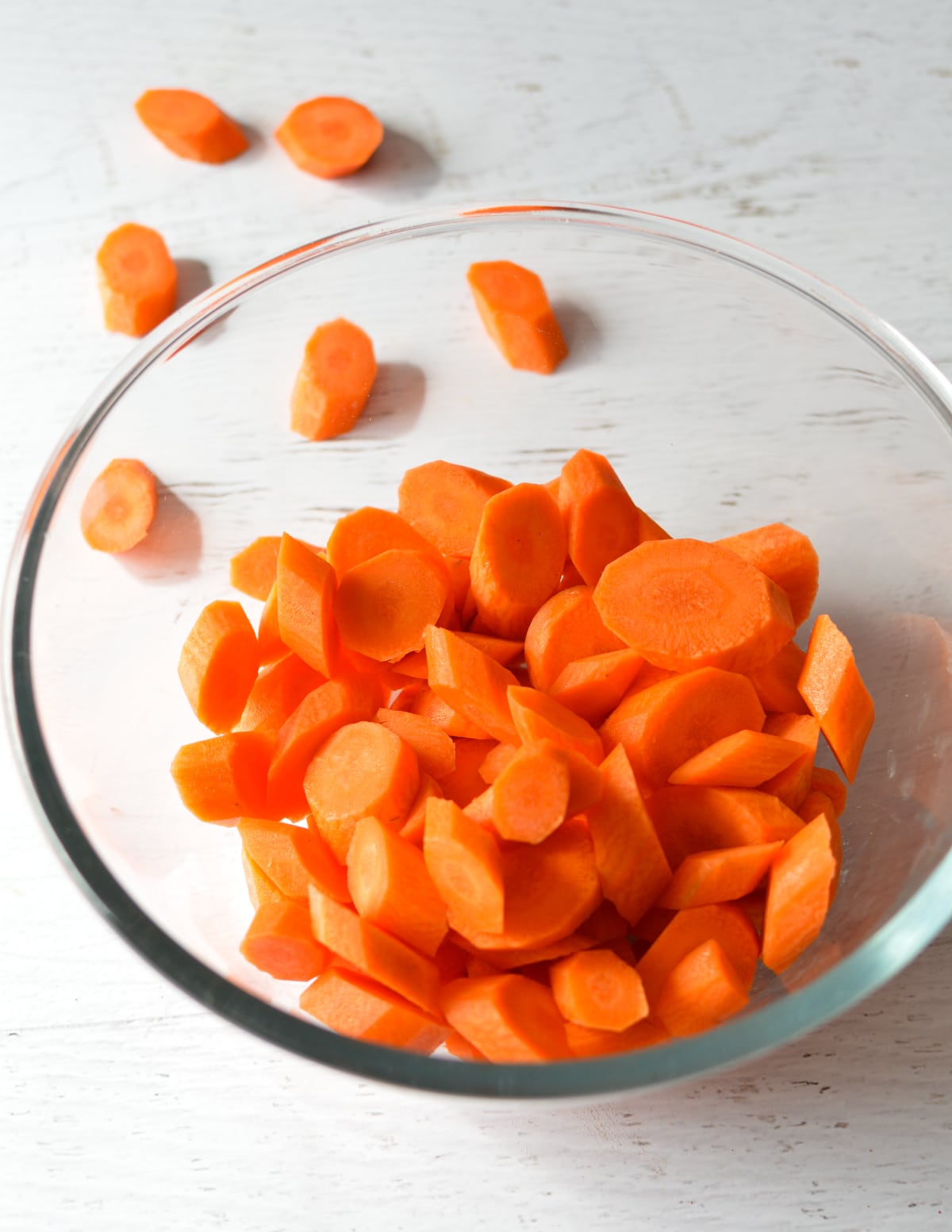 cut and peeled carrots in a bowl.