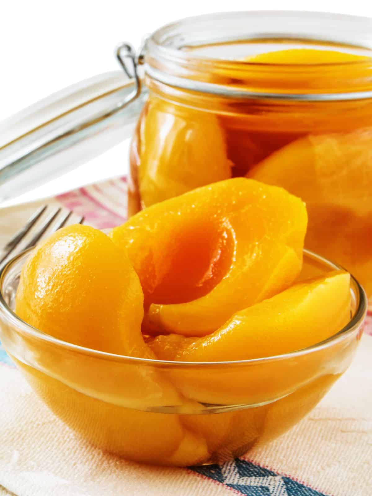 a bowl of canned peaches.