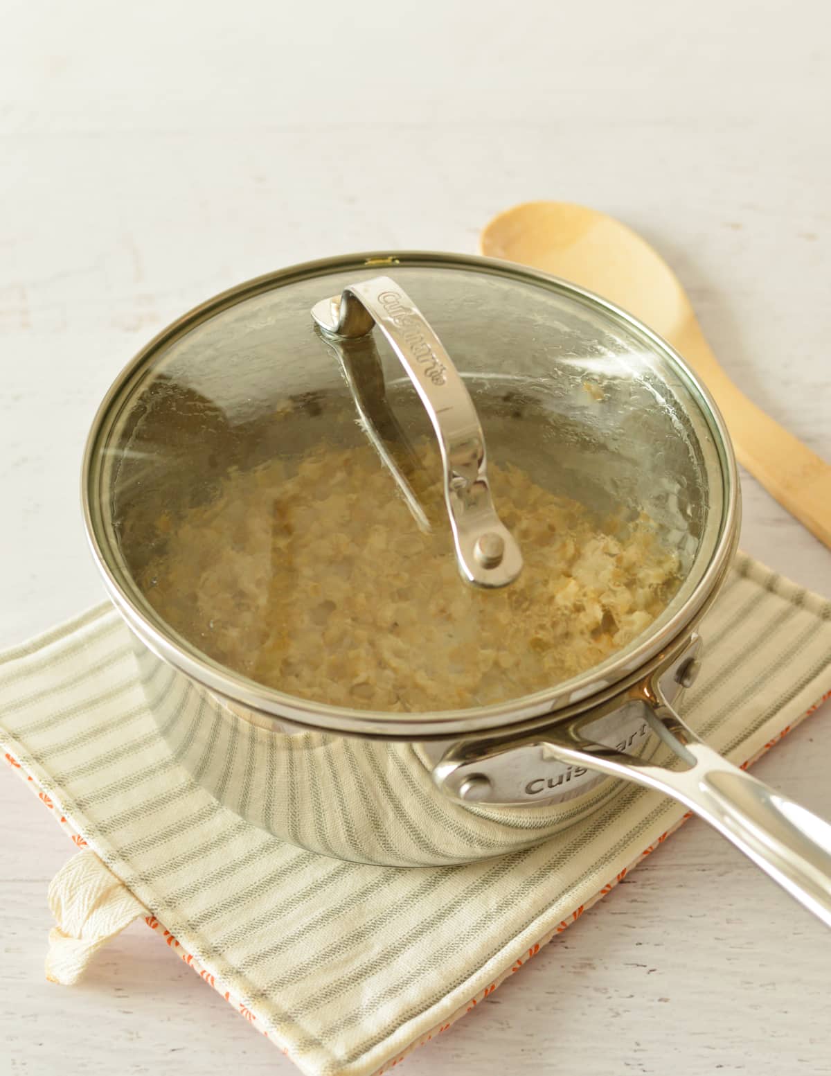 oatmeal in a pan with a lid.